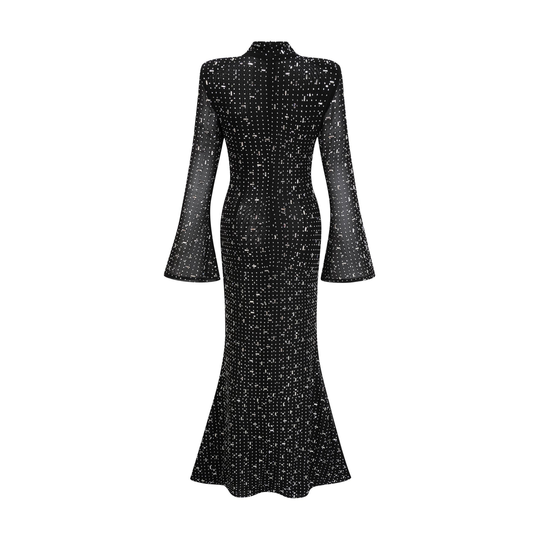 A black floor length maxi dress with sheer elements and embellished details worn by a model standing against a plain background