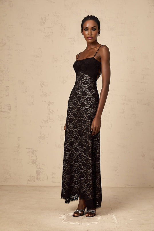 A black floral lace maxi dress with an open back design named Zelie