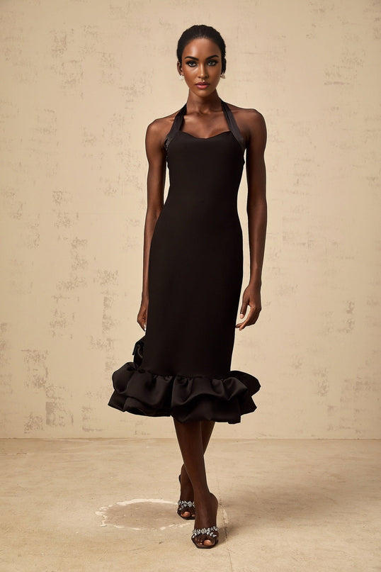 A black halterneck midi dress with a bubble hem featuring a fitted bodice and flared skirt