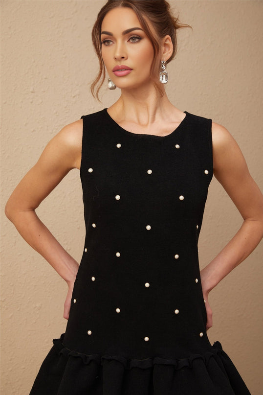 A black knitted mini dress with bead embellishments named Blanche