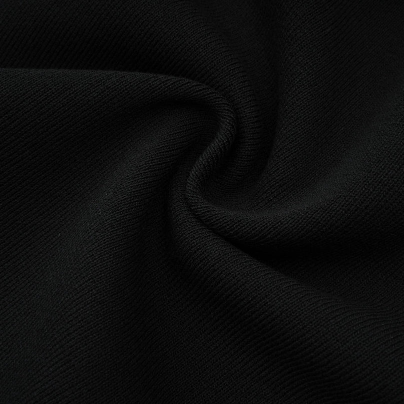 A black knitted mini dress with embellishments and ruffled details named Fabienne