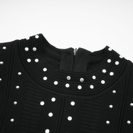 A black knitted mini dress with embellishments and ruffled details named Fabienne
