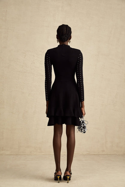 A black knitted mini dress with embellishments and ruffles named Fabienne