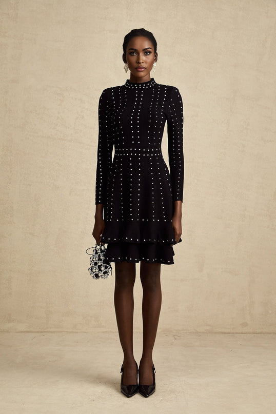 A black knitted mini dress with ruffles and embellishments named Fabienne