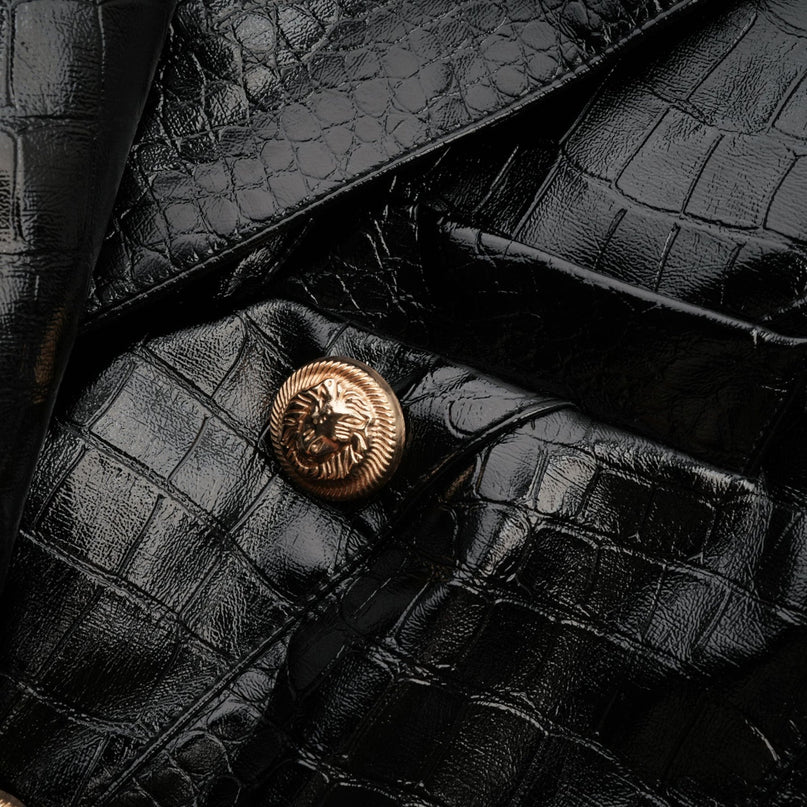 A black leather jacket with a cinched waist design named Elodie