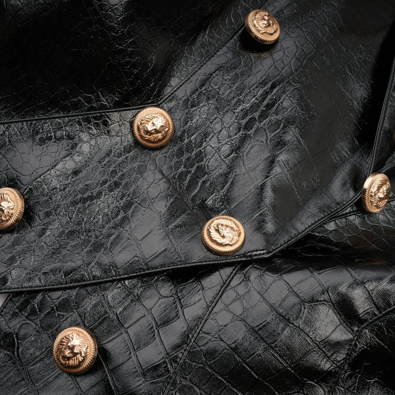A black leather jacket with a cinched waist design named Elodie