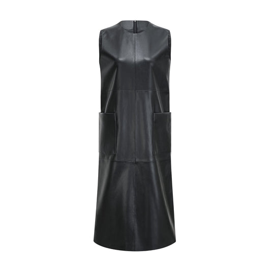 Sleek Pitch Black sleeveless dress featuring a chic round neck and luxurious leather feel Functional front welt pockets and a convenient rear zip fastening Elegant midi length composed of 100% PU for durability