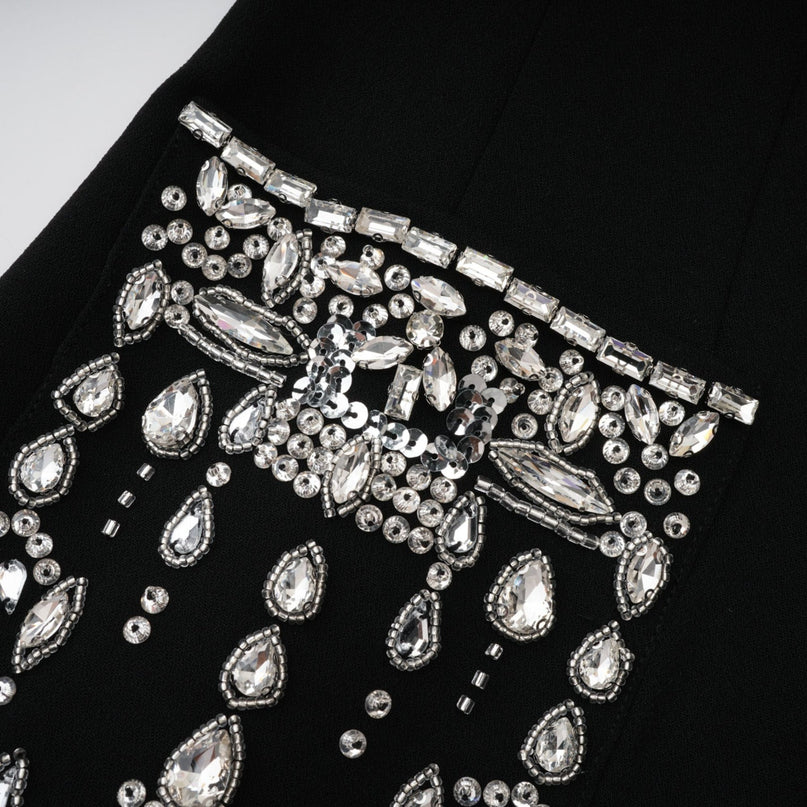 A black maxi blazer dress with embellishments named Diane featuring a long silhouette and formal styling