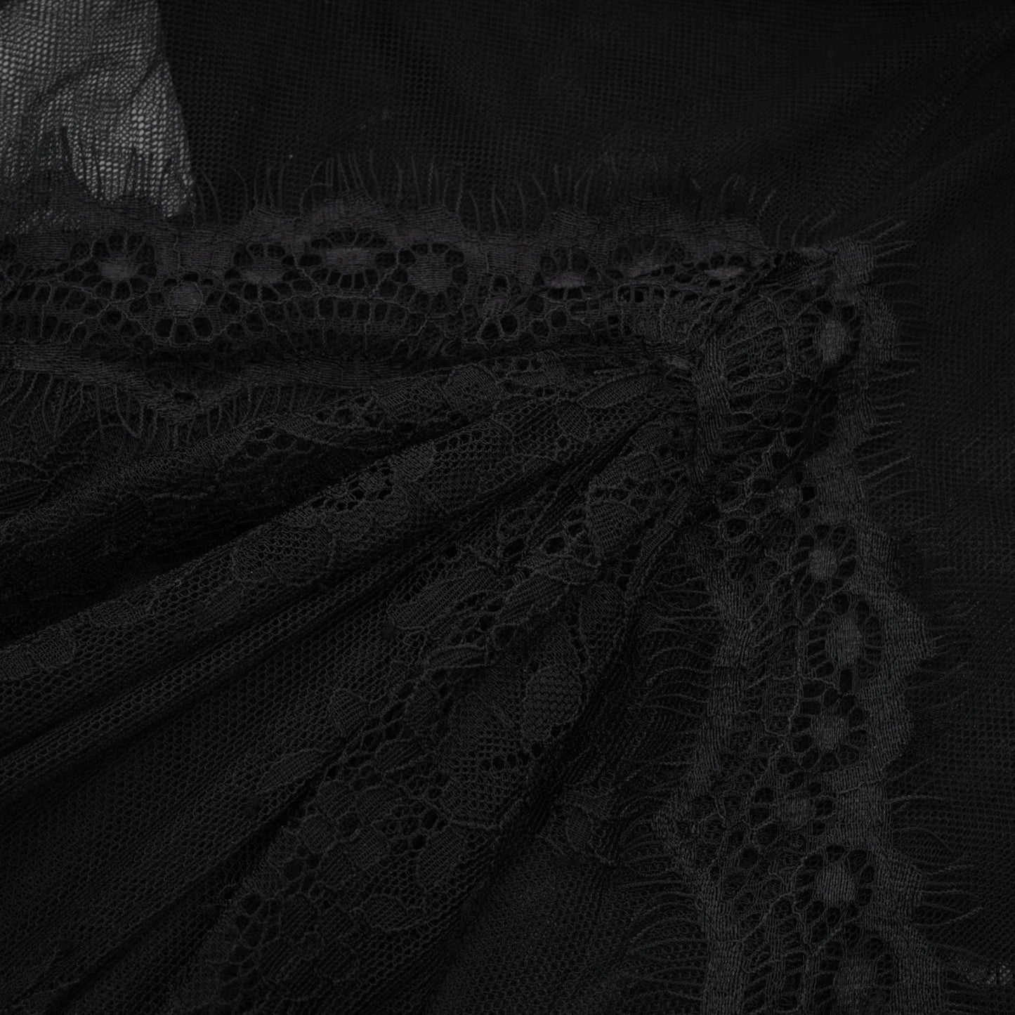 Black lace overlay dress with chic sleeveless cut dazzling crystal embellishment unique crossover design and classic floorlength silhouette