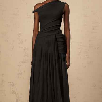 A black maxi dress with a single shoulder strap and shirred panel detailing along the bodice and skirt