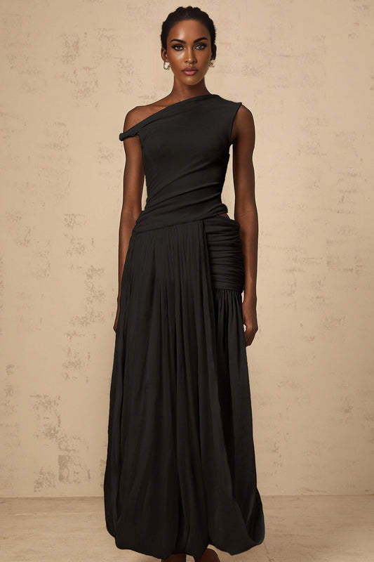 A black maxi dress with a single shoulder strap and shirred panel detailing along the bodice and skirt