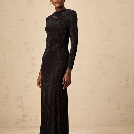 A black maxi dress with ruched mesh fabric and rhinestone embellishments