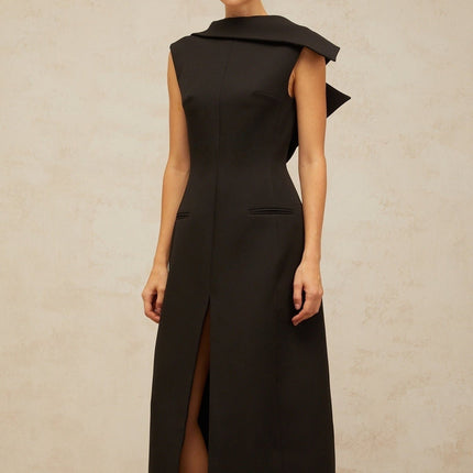 A black midi dress with an open back and deconstructed design named Leonore