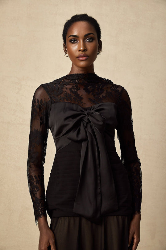 A black midi dress with floral lace panels named Amelie