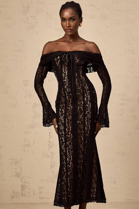 A black midi dress with floral lace pattern and flared cuffs named Emeline