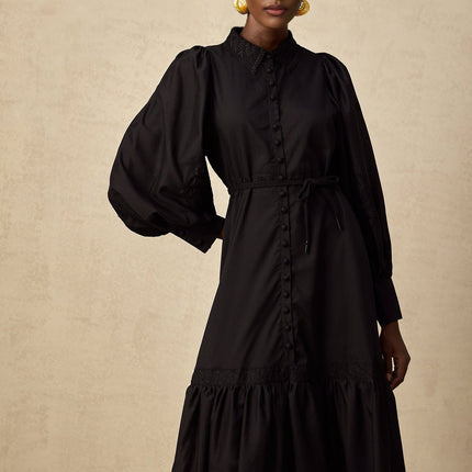 A black midi dress with lace embroidery details named Arcadia
