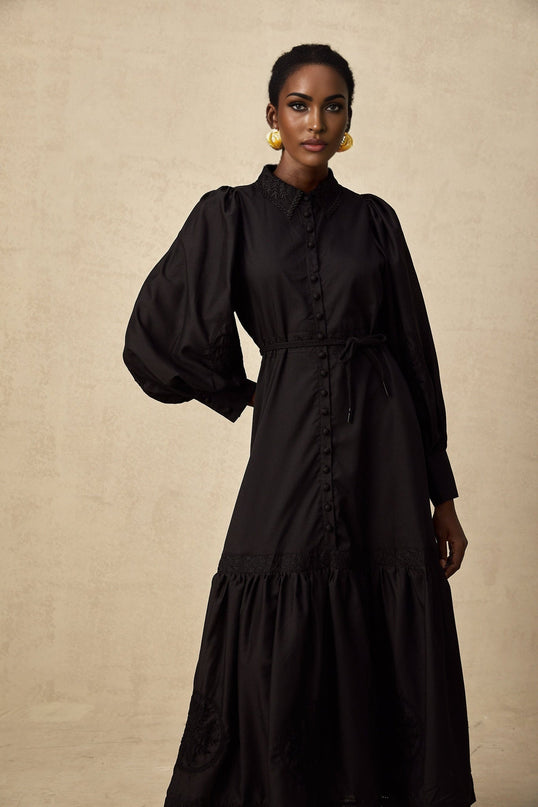 A black midi dress with lace embroidery details named Arcadia