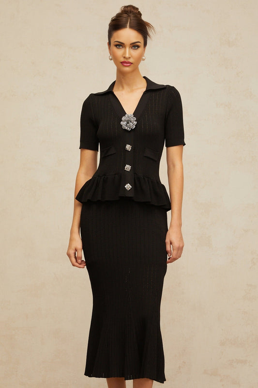A black midi dress with pointelle knit detailing and embellishments named Felicie