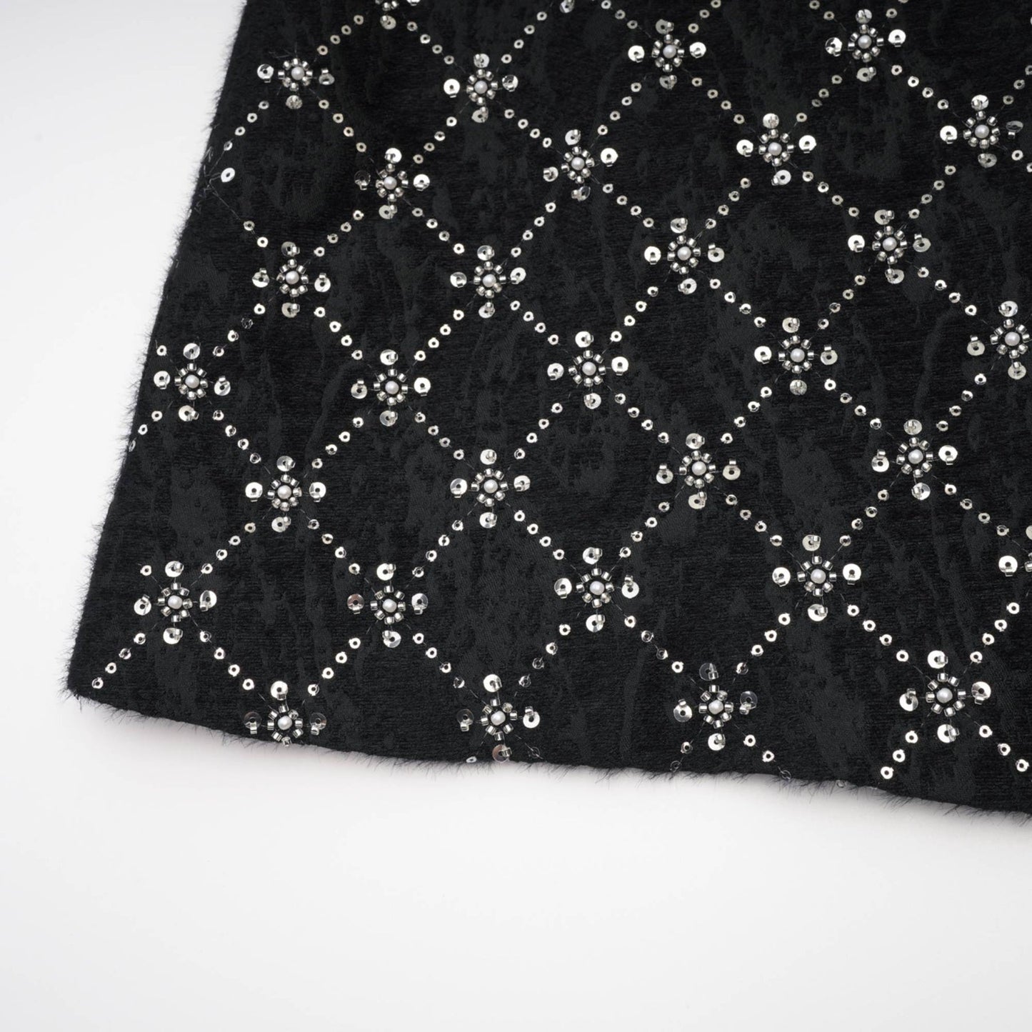 Black dress with round neckline sleeveless rear zipper adorned with shiny crystals made of 100% polyester