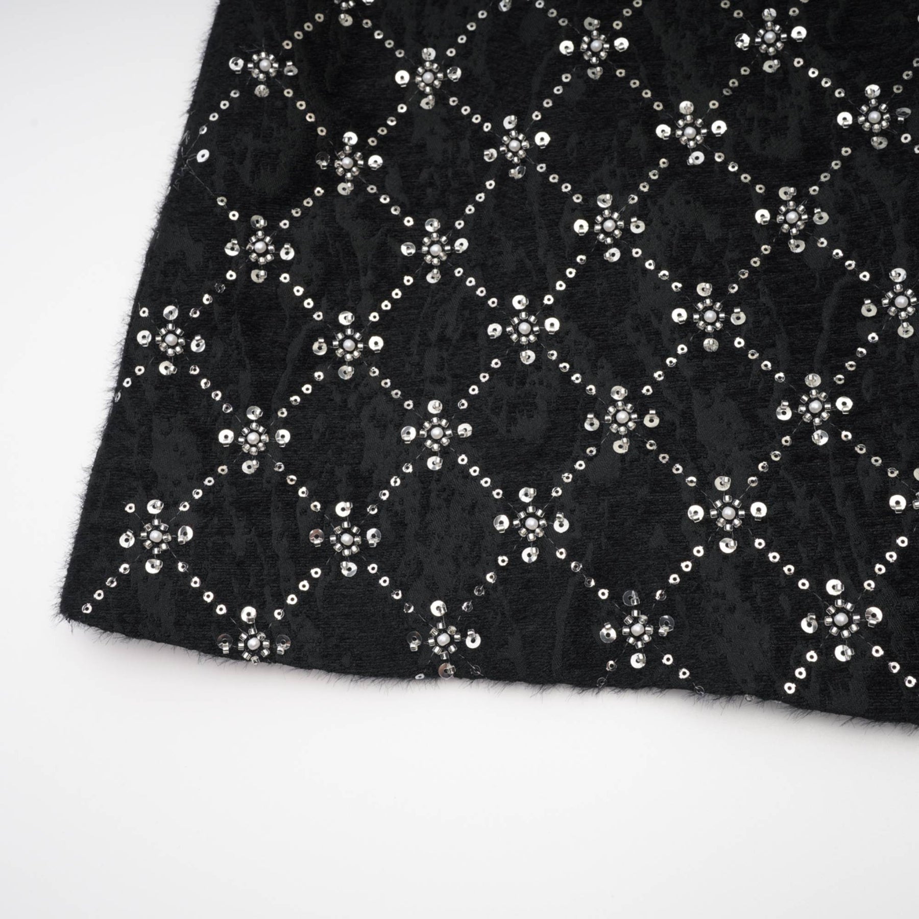 Black dress with round neckline sleeveless rear zipper adorned with shiny crystals made of 100% polyester