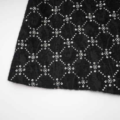 Black dress with round neckline sleeveless rear zipper adorned with shiny crystals made of 100% polyester