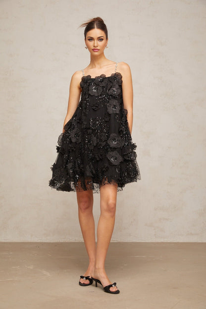 A black mini dress with a floral pattern adorned with crystal embellishments called Suzette