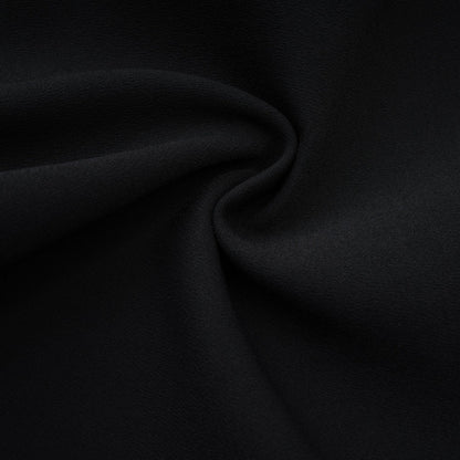 Sleek black dress with halter neck gold buttons zip closure and thigh length