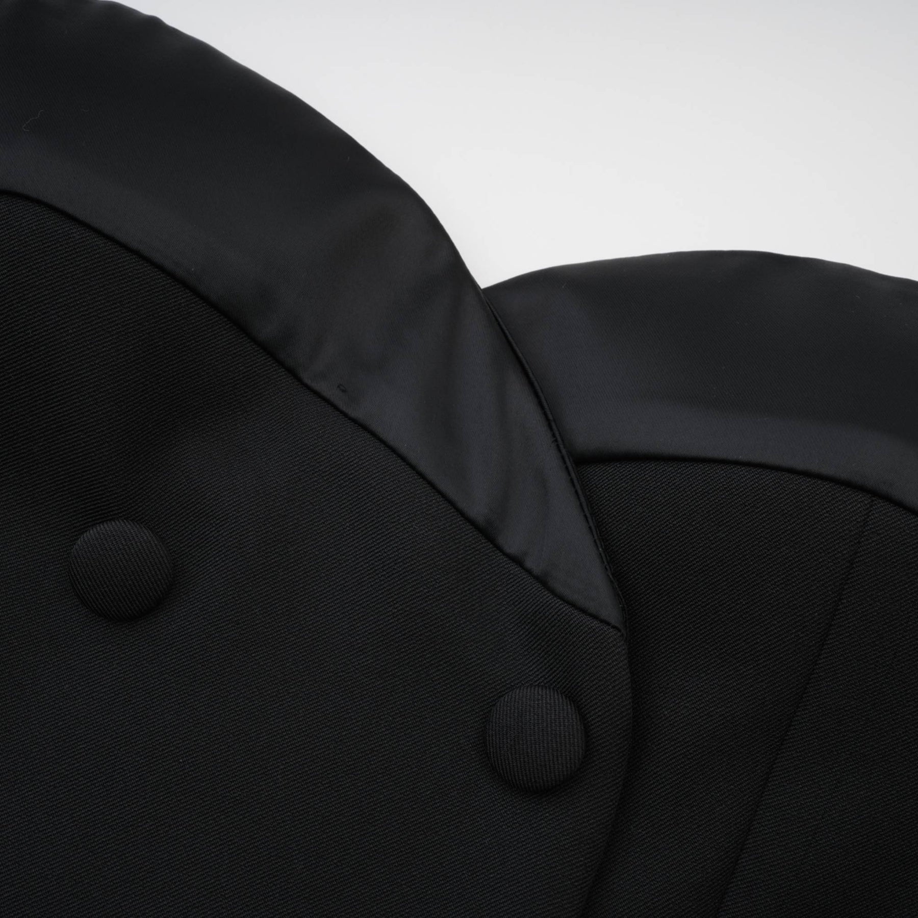 Black bustier style dress with front doublebreasted button detailing and cinched waist Sleeveless with lacedetail trims and rear zip fastening Made of 100% Polyester