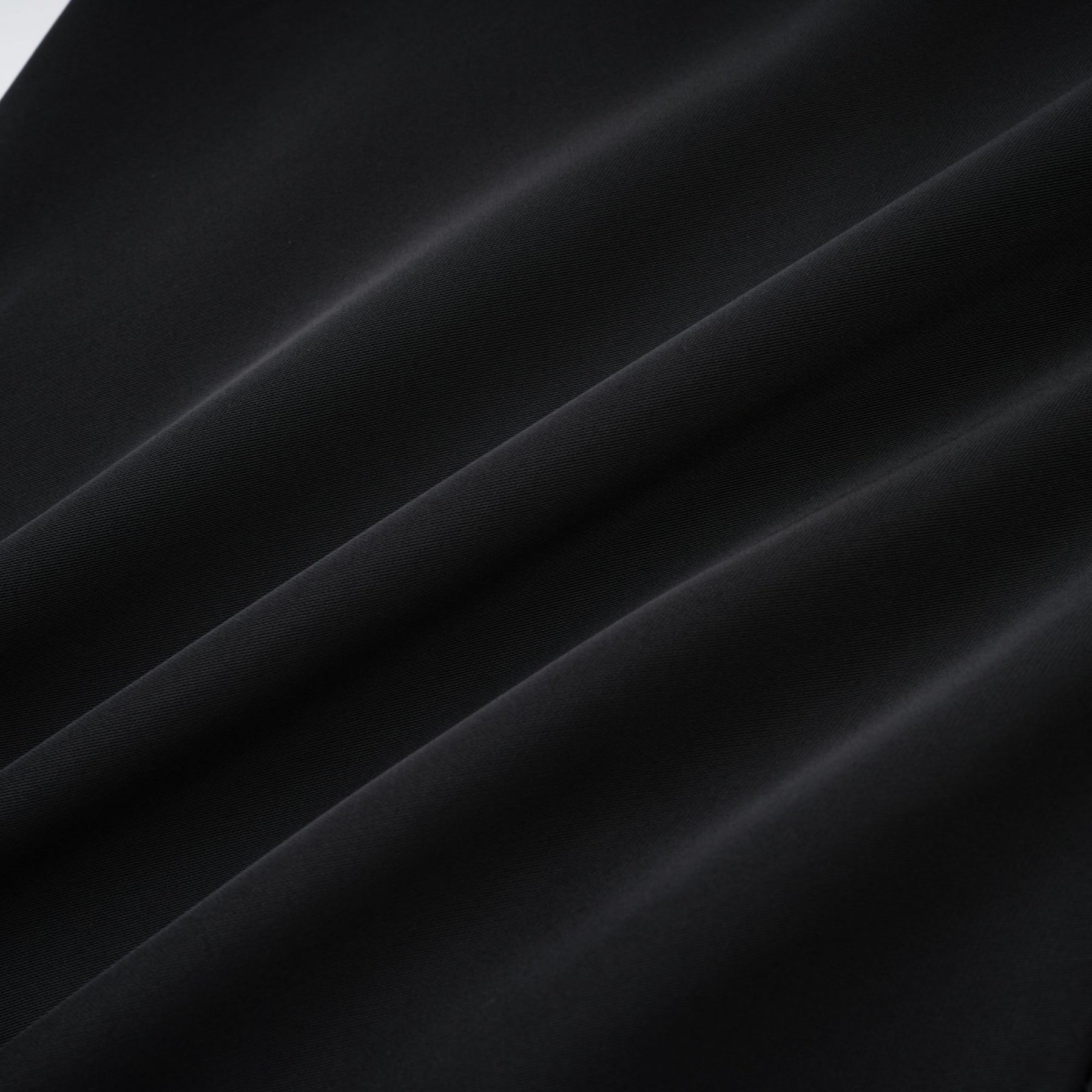 Black sleeveless dress with spaghetti straps square neck draped design rear zip fastening and mini length in 80% Polyester 20% Cotton composition