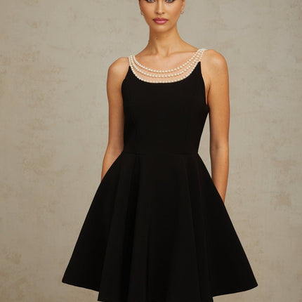 A black mini dress with faux pearl embellishments named Danae