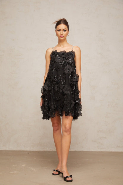 A black mini dress with floral pattern and crystal embellishments called Suzette