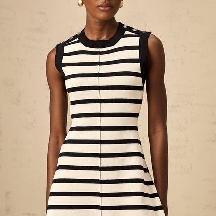 A black mini dress with horizontal stripes in a knit fabric called Heloise