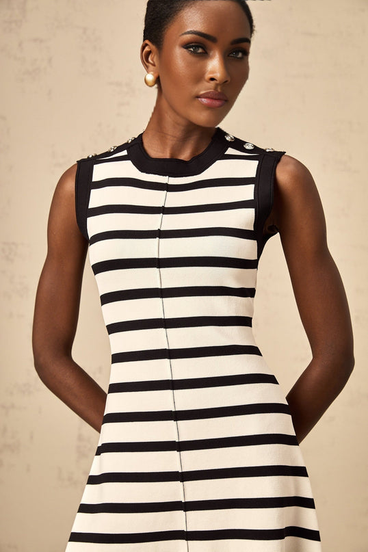 A black mini dress with horizontal stripes in a knit fabric featuring a formfitting silhouette and short length