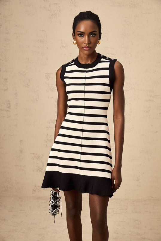 A black mini dress with horizontal white stripes knitted fabric short length and fitted silhouette