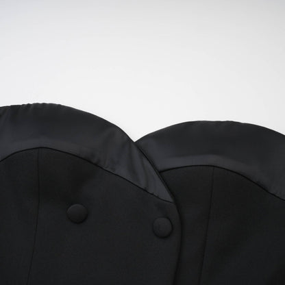 Sleek black bustier dress with doublebreasted buttons cinched waist and lace trims