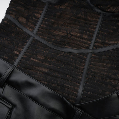 Formfitting black dress with mesh details and a fauxleather finish