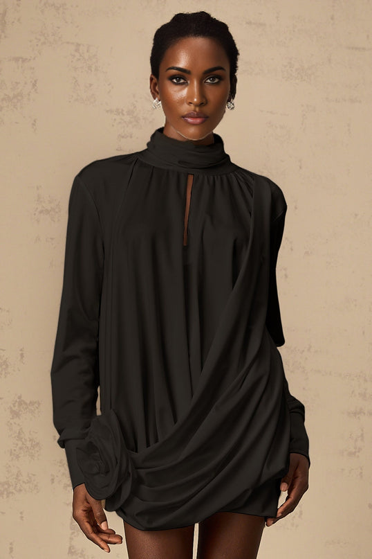 A black mini dress with ruched detailing and faux flower embellishments