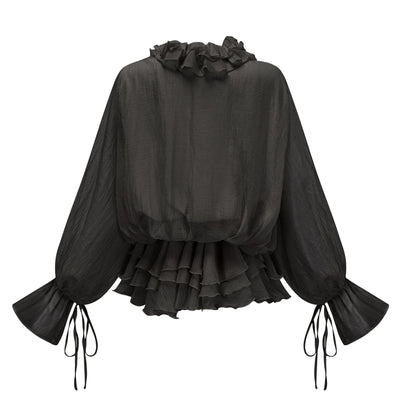 A black mini dress with tiered layers and floral applique details called Zephyrine