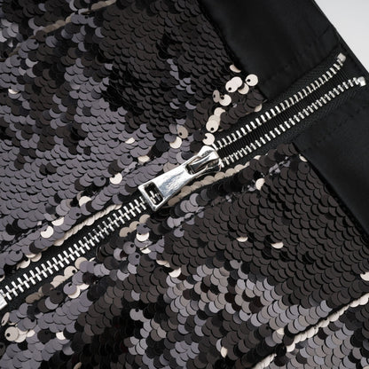 Black dress with sparkling finish sequin decoration rear zip closure straight hem thighlength 100% Polyester