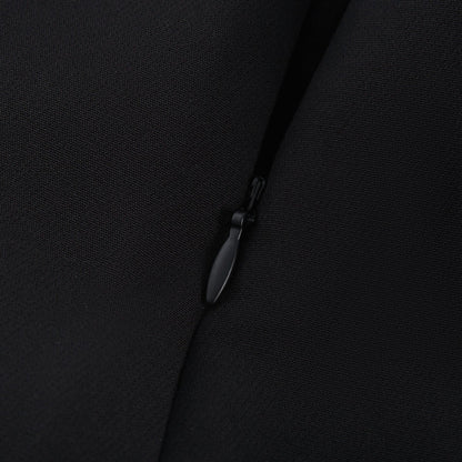 A black thighlength dress with fauxflower adornment and side zip closure in 100% Acetate fiber