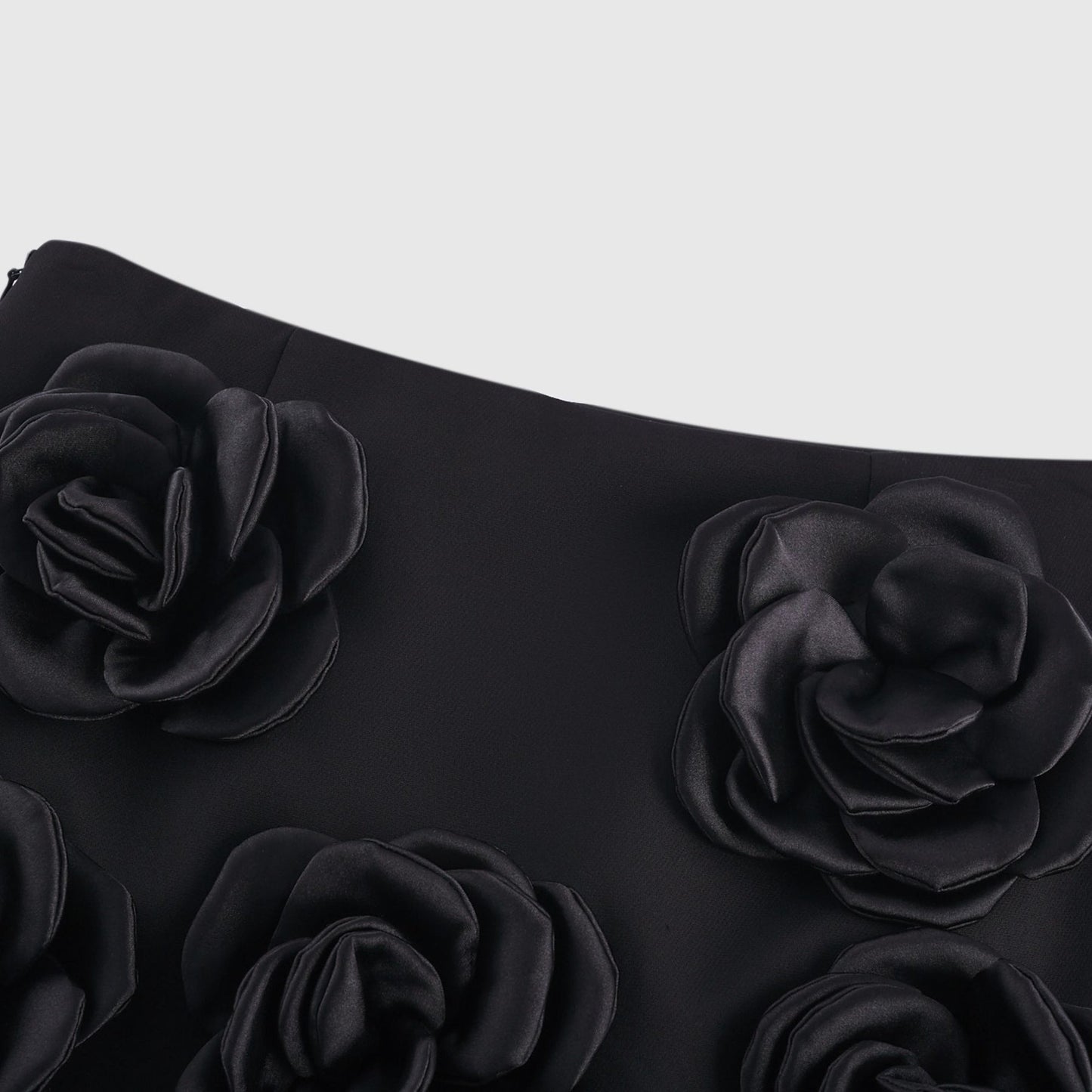 Black dress with fauxflower detail side zip sleek hem and thighlength Made of 100% Acetate fiber