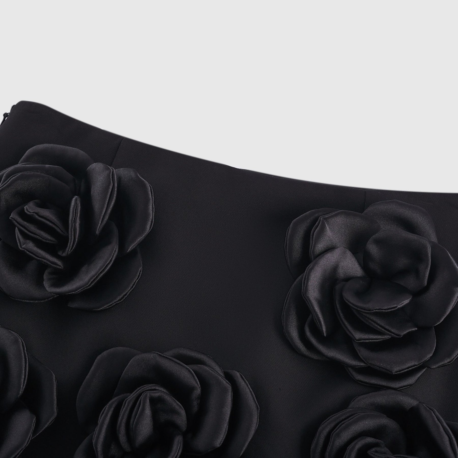 Black dress with fauxflower detail side zip sleek hem and thighlength Made of 100% Acetate fiber