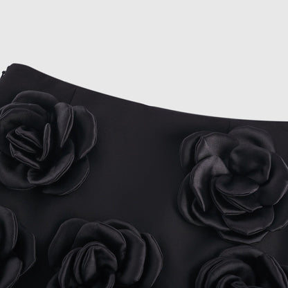 Black dress with fauxflower detail side zip sleek hem and thighlength Made of 100% Acetate fiber