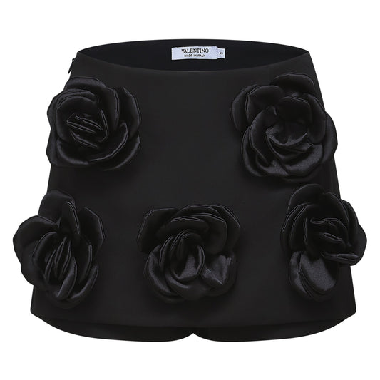 Black thighlength dress with fauxflower adornment and side zip closure made of 100% Acetate fiber