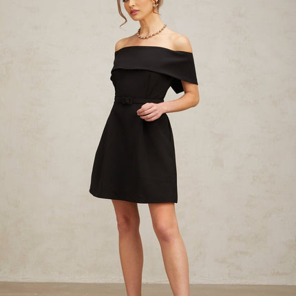 A black off shoulder mini dress with a belt cinching the waist featuring a sleek and elegant design