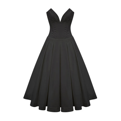 A black offshoulder midi dress with a corsetstyle bodice worn by a model standing against a plain background