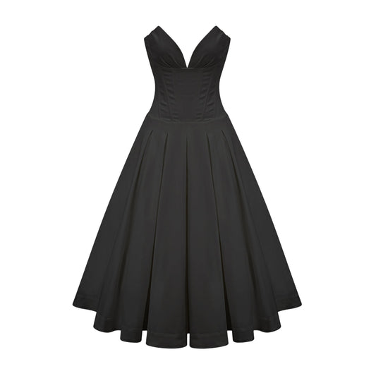 A black offshoulder midi dress with a corsetstyle bodice worn by a model standing against a plain background