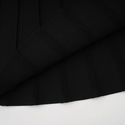 A black offshoulder mini dress with a bow detail and knit fabric featuring a fitted silhouette and short length