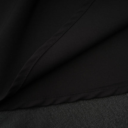 A black pleated midi dress with a button front closure featuring the name Viviane