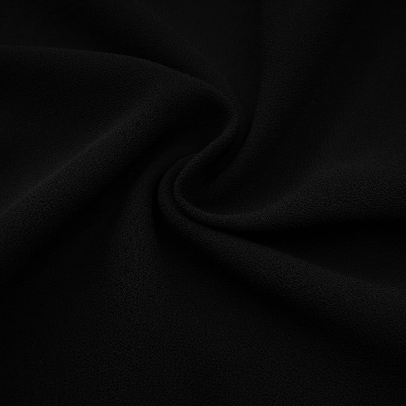 A black pleated midi dress with a buttonfront design and the name Viviane